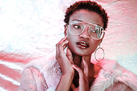 Model Poses With Neon Reflection Photo thumbnail