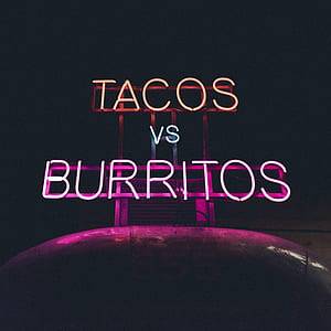 turned on white and purple Tacos vs Burritos LED signage thumbnail