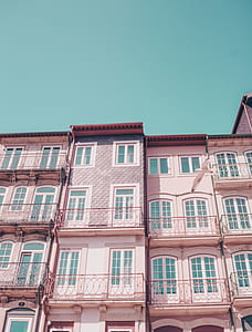 beige high rise houses thumbnail