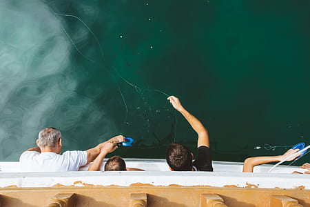 boy fishing on water thumbnail