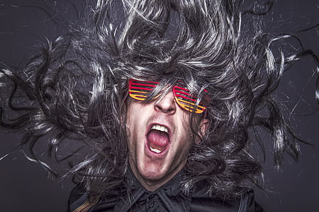 digital photo of man with black hair and red and white shutter sunglasses thumbnail