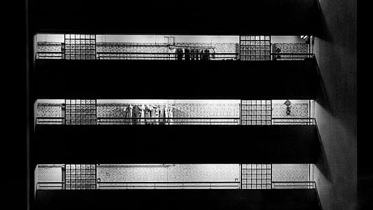 Grayscale Photography of 3-storey Building thumbnail