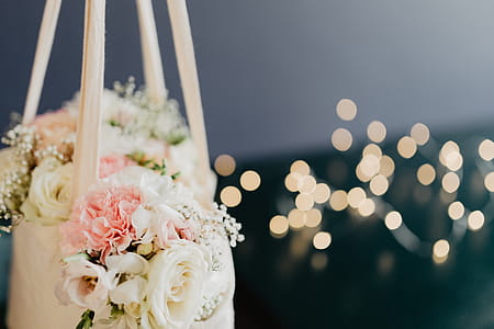 Bouquet of flowers in a bag with some fairy lights thumbnail