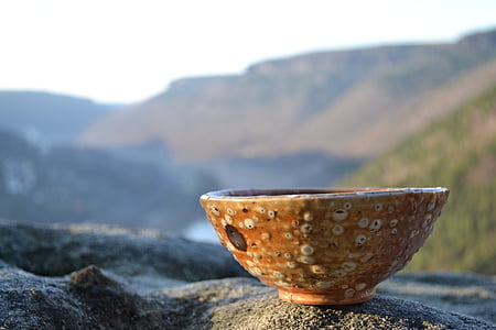 round brown ceramic bowl closeup photography thumbnail