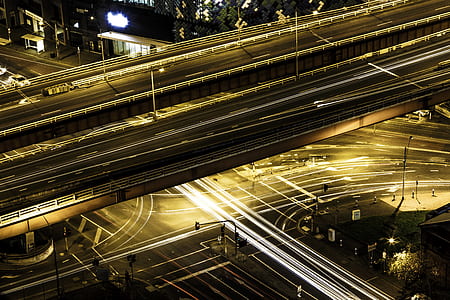 time lapse photography of vehicle and street during nighttime thumbnail