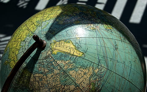 selective focus photography of desk globe thumbnail
