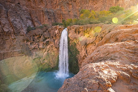 high angle photography of waterfalls thumbnail
