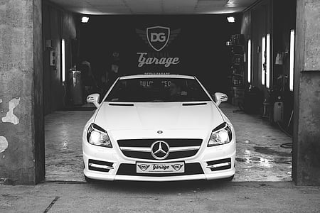 white Mercedes-Benz SLS inside garage thumbnail