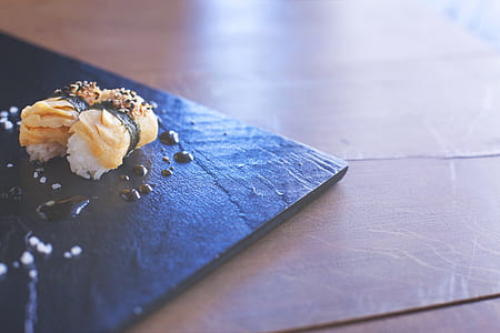 sushi dish on black plate thumbnail