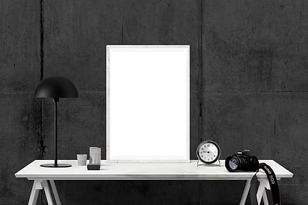 grayscale photography of console table thumbnail