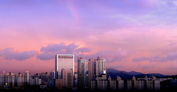 high rise buildings on noon time thumbnail