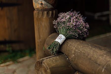 pink cluster flowers bouquet on brown wooden fence thumbnail