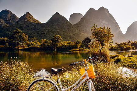 white cruiser bicycle photo during daytime thumbnail