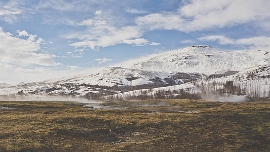 wide angle photo of snow-capped mountain thumbnail