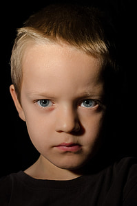 boy wearing black top thumbnail