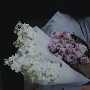 bouquet of white orchids and purple roses thumbnail