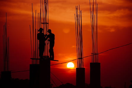 silhouette of two people during sunset thumbnail
