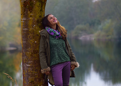 woman wearing gray coat thumbnail