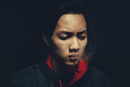 man in black and red jacket thumbnail