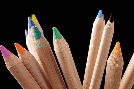 assorted-color coloring pencils with black background thumbnail
