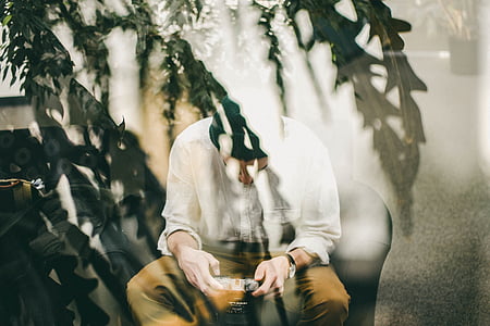 man sitting on chair thumbnail