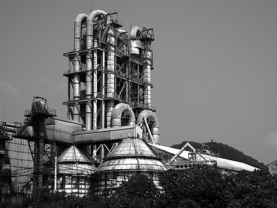 grayscale photo of building surrounded by trees thumbnail