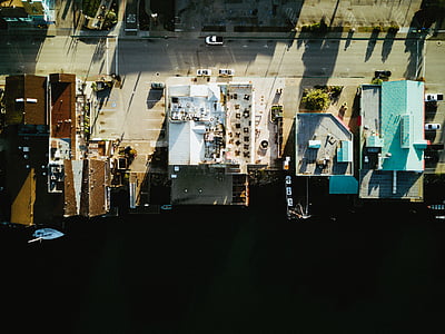 bird's-eye view of white building and house thumbnail