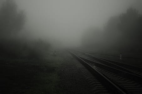 train railways covered with white clouds thumbnail
