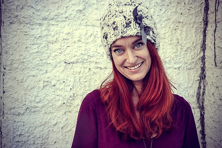 Woman With Red Hair Wears Purple Top thumbnail