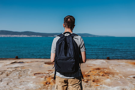 Man looking out to sea thumbnail