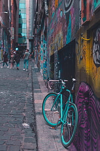 bike on wall with graffiti artworks thumbnail