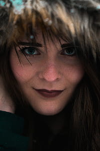close up photography of woman's face with red lips thumbnail