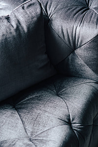 Close-ups of pillows and a grey sofa thumbnail