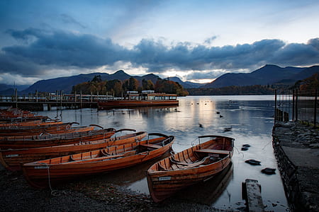 boats near dock during daytime thumbnail
