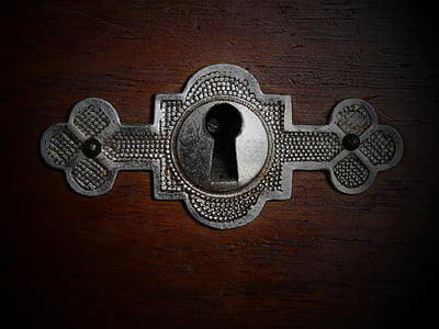 focus photo of gray metal drawer keyhole thumbnail