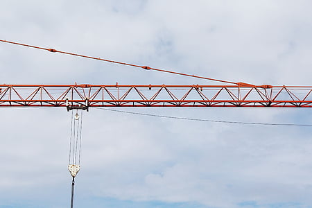 tower crane under blue sky thumbnail