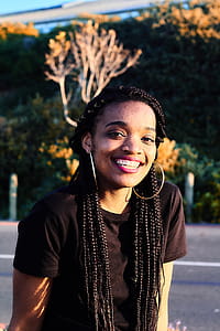 Woman Smiling While Taking Her Picture thumbnail
