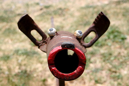 closeup photography of brown dog figurine at daytime thumbnail