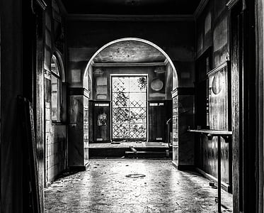 grayscale photo of hallway inside closed room thumbnail