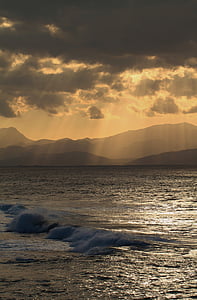 body of water near mountain thumbnail