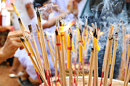 Close-up Photo of Lighted Incense Sticks thumbnail