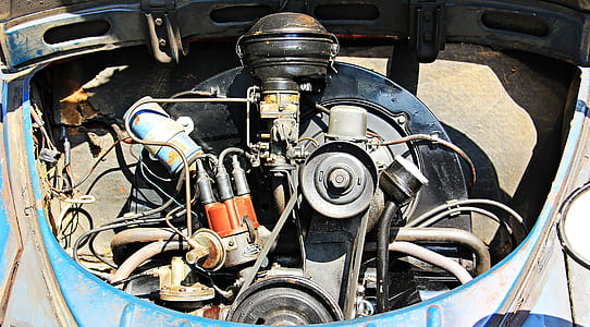 black and gray vehicle engine at daytime thumbnail