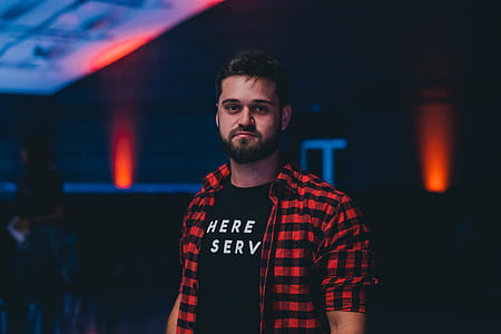 man standing in dark room thumbnail