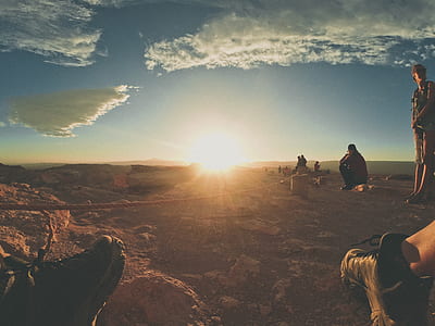 group of people on top of mountain thumbnail