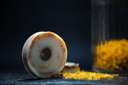 round white decor beside gold closeup photography thumbnail