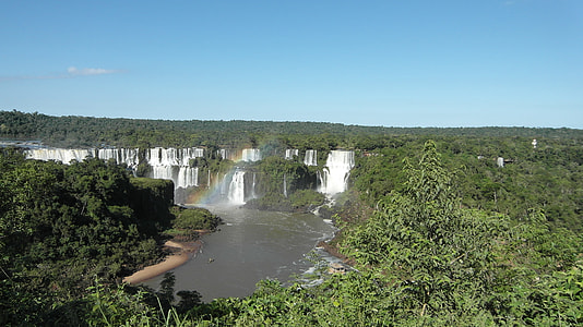 cascading waterfalls surrounded by forest thumbnail