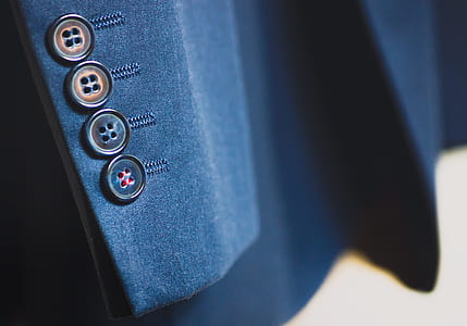 selective focus photography of suit jacket thumbnail