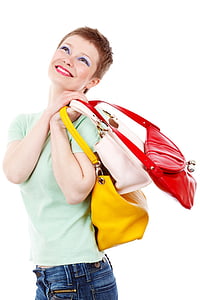woman carrying three leather handbags thumbnail