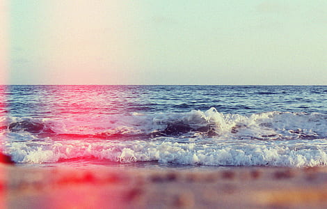 ocean wave during daytime thumbnail