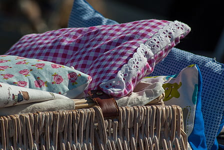 pillow on wicker base thumbnail
